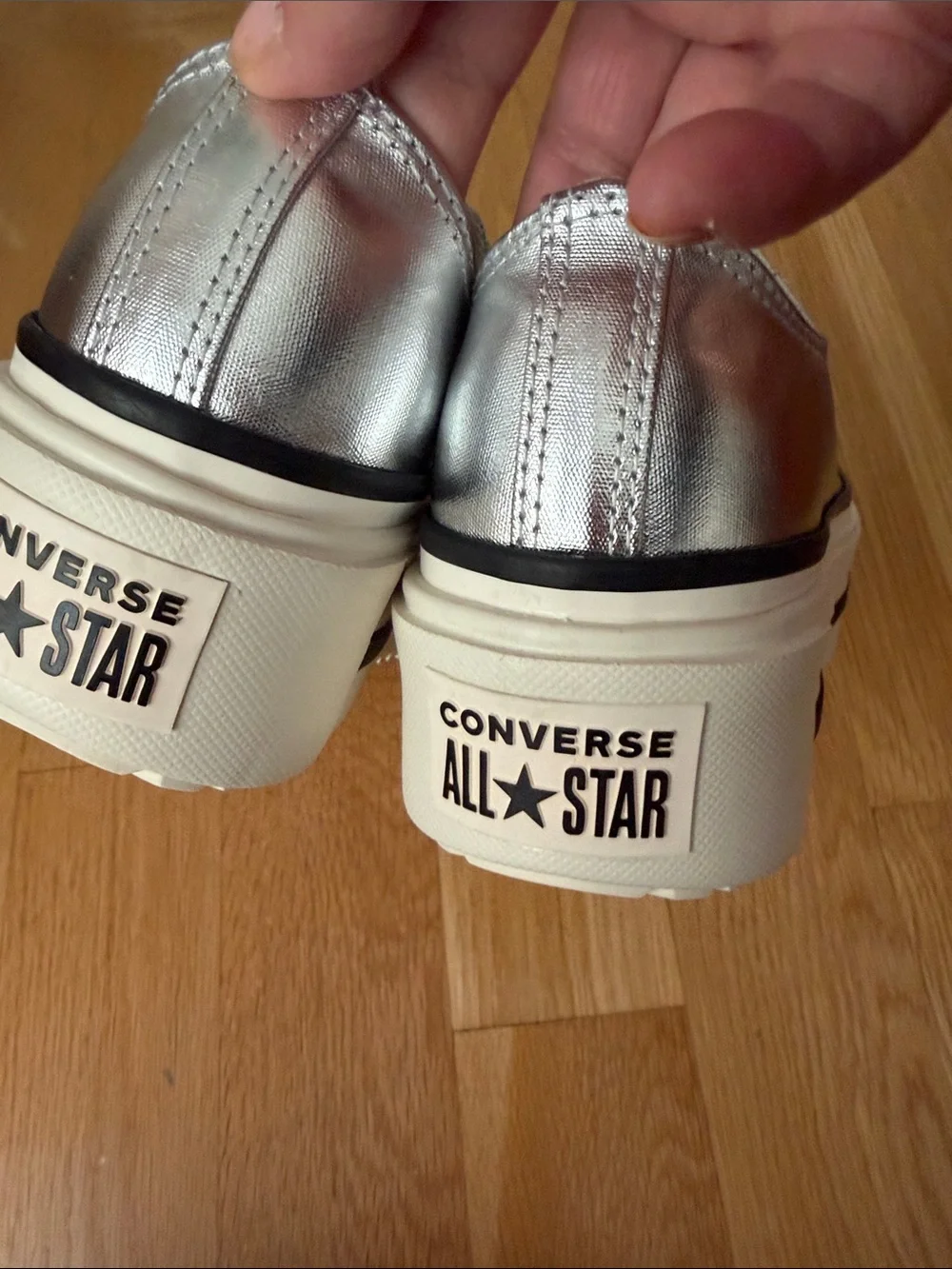 Converse Women’s Platform Sneakers - Metallic Silver with White Sole.